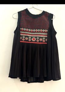 Chic Black Pleated Peplum Top