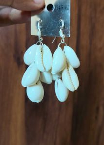 Peacock feather oxidised earrings and shell cowrie