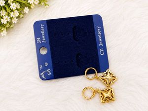 Elegant Gold Tone Star Earrings with Crystals