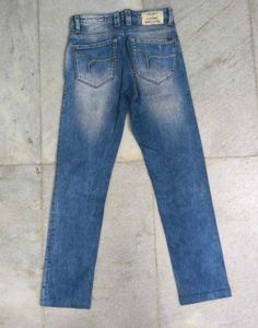 Distressed Blue Denim Jeans