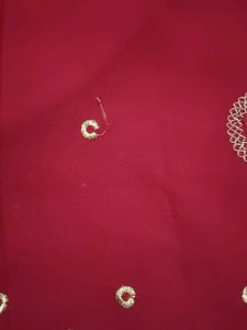 a beautiful red saree