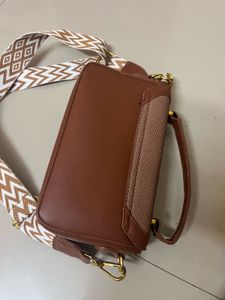 Chic Brown Crossbody Bag with Patterned Strap