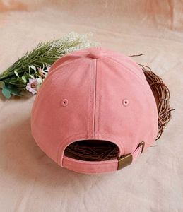 Hand-Embroidered Pink Cap with Doll Design