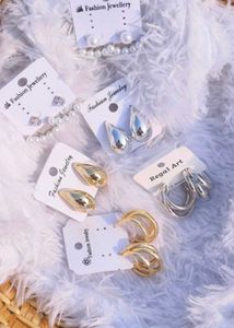 Korean Studs Silver And Gold One Pair 99