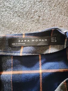 Plaid Sleeveless Peplum Top