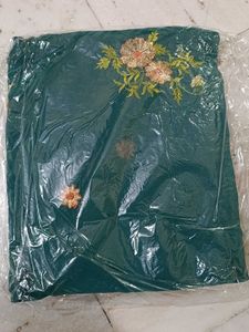 Elegant Teal Saree with Floral Embroidery