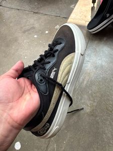 Puma Black &amp; Gold Sneakers