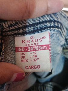 It's a Y2K style denim skirt with funky ruffles.