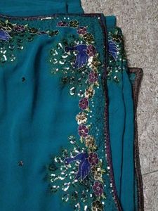 Exquisite Teal Saree with Peacock Embroidery