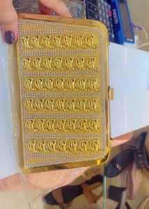 Elegant Gold Clutch with Embellishments