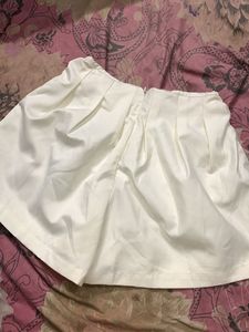 Cream High-Waisted Pleated Shorts
