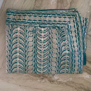 Elegant Teal Embroidered Fabric..