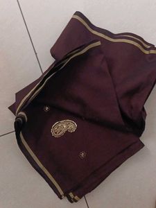 Elegant Brown Saree with Gold Border