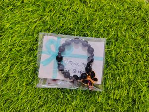 Elegant Beaded Bracelet with Butterfly Charm