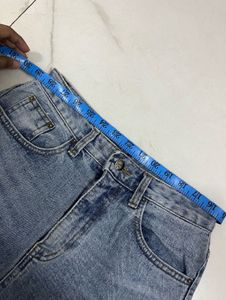 Oversized T-shirt + Light Blue Wide-Leg Jeans