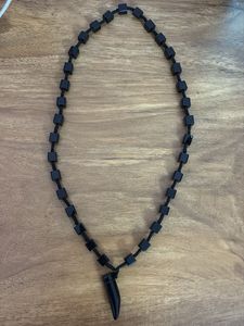 Black Beaded Necklace with Tooth Pendant