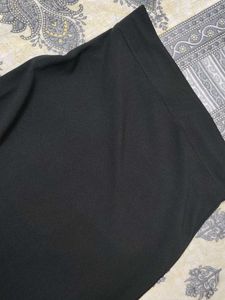 side slit black skirt medium length
