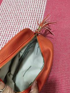 Chic Orange Crossbody Bag with Gold Chain
