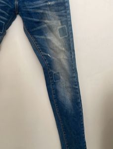 Distressed Denim Jeans