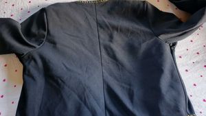 Chic Black Cropped Jacket with Gold Chain Trim