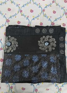 Elegant Black Saree with Blue Floral Print