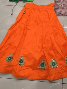 Vibrant Orange &amp; parrot Embroidered Lehenga Choli
