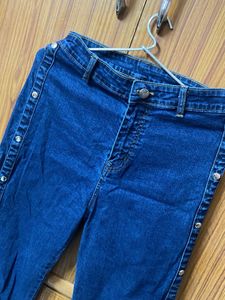 High-Waisted Flare Jeans with Button Detail