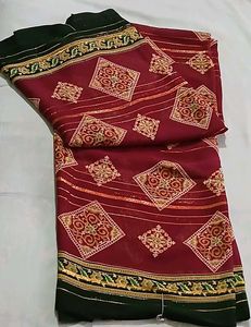 Elegant Maroon Saree with Gold Motifs