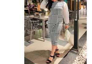 black white mid length dress