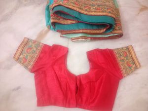 Elegant Teal Saree with Gold Embroidery