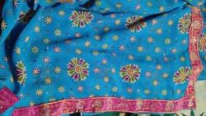 Stunning Blue Floral Saree with Pink Border