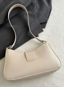 Cream Shoulder Bag with Silver Buckle
