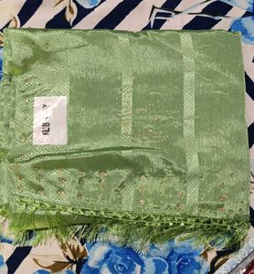 Elegant Green Saree with Embellishments