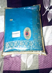 new Beautiful Teal Saree with Floral Border