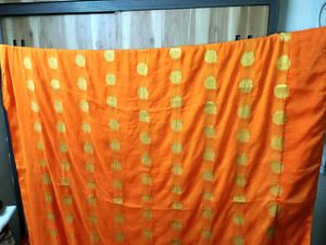 Vibrant Orange Saree with Gold Dots
