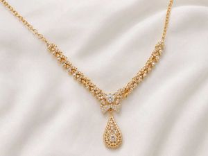 Elegant Gold Necklace with CZ Stones
