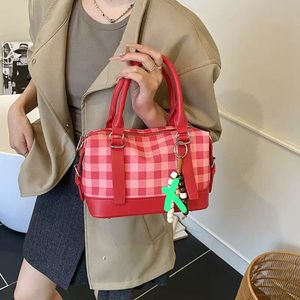 Chic Pink Plaid Handbag with Charm
