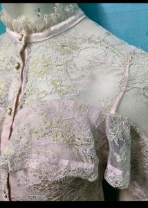 Elegant Pink Lace Blouse with Gold Accents