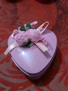 Heart shaped metal box with laughing buddha