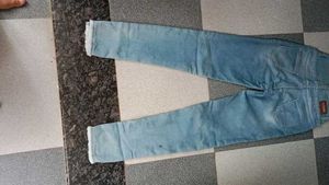 Light Wash Distressed Hem Jeans
