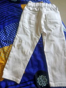 Black Shirt; White Pant And Velvet Type Pan