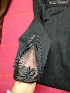 Elegant Black Embellished Top