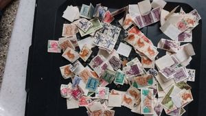 100+ ASSORTED INDIAN STAMPS