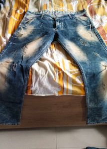 Distressed Blue Denim Jeans