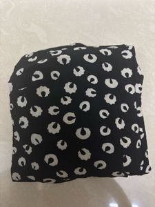 Black &amp; White Patterned Peplum Top with Solid