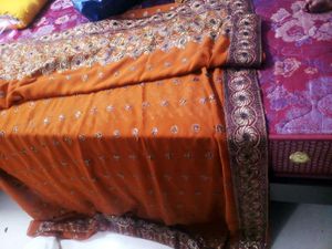 Elegant Orange Embroidered Saree