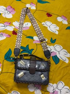 Stylish Black Crossbody Bag with Patches