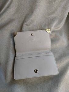 Chic White Quilted Wallet with Accent Detail
