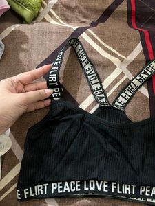 Trendy Black Ribbed Bra with Statement Straps