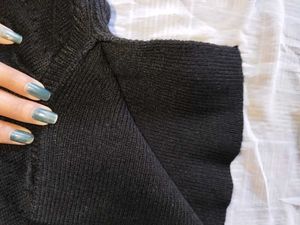 Black Knitted Poncho with Tassels